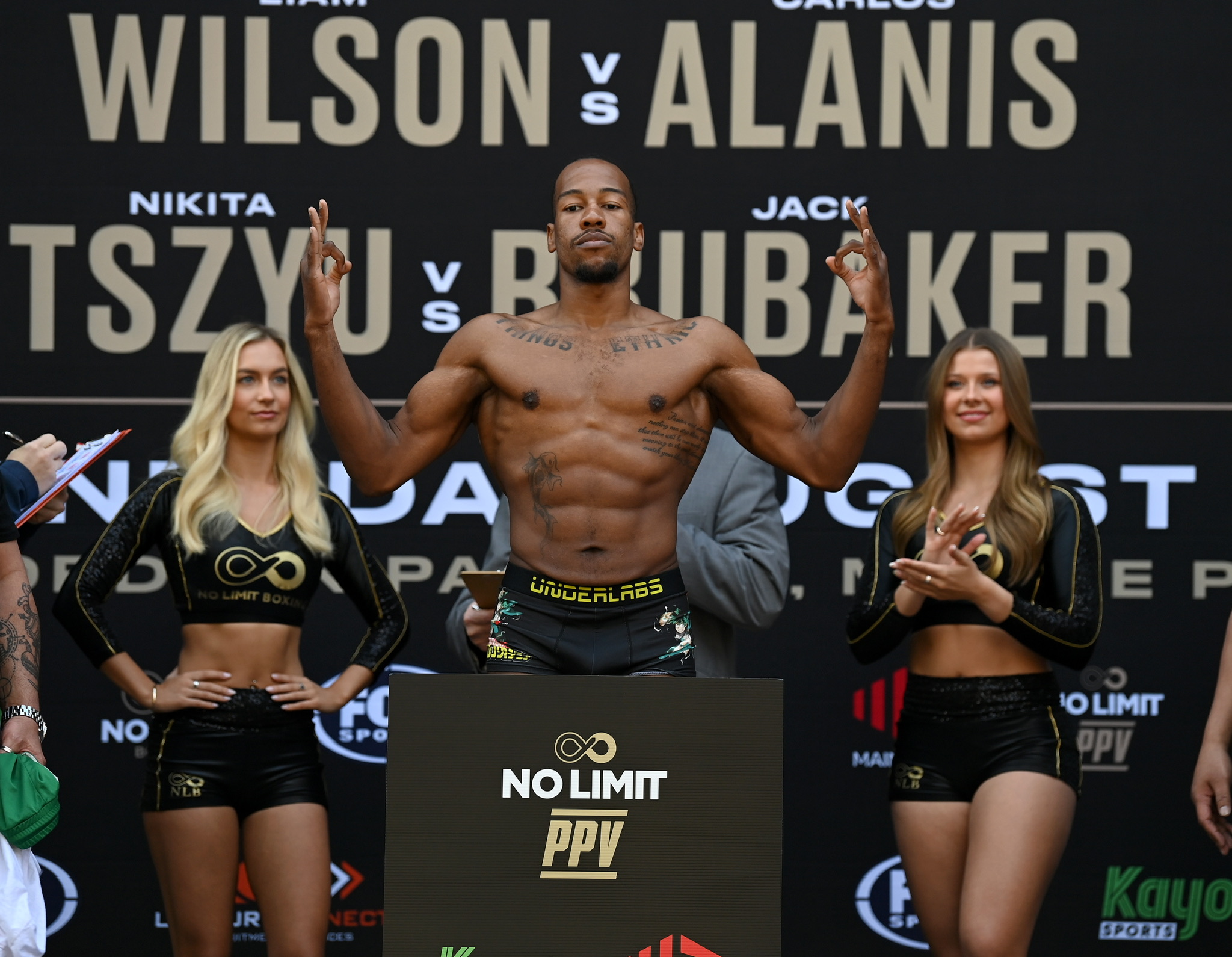 Etienne Ralph on the scales at a No Limit Boxing weigh-in
